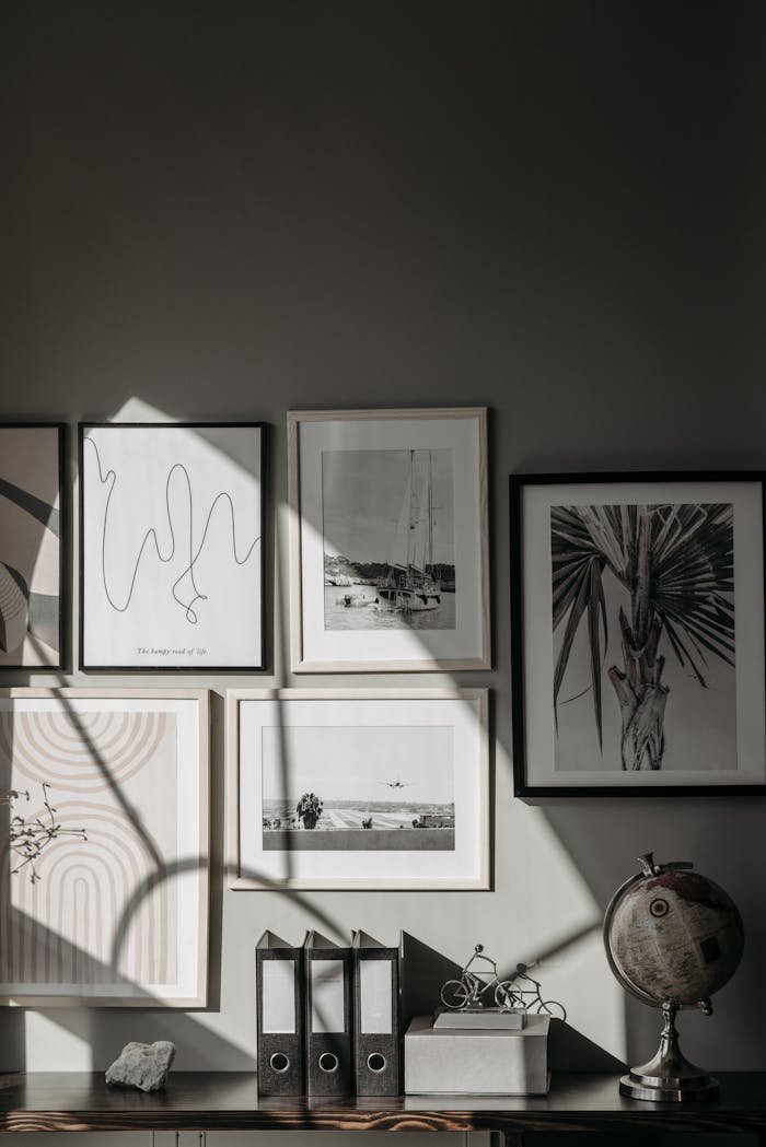 Stylishly arranged wall frames and decor create a contemporary interior space.